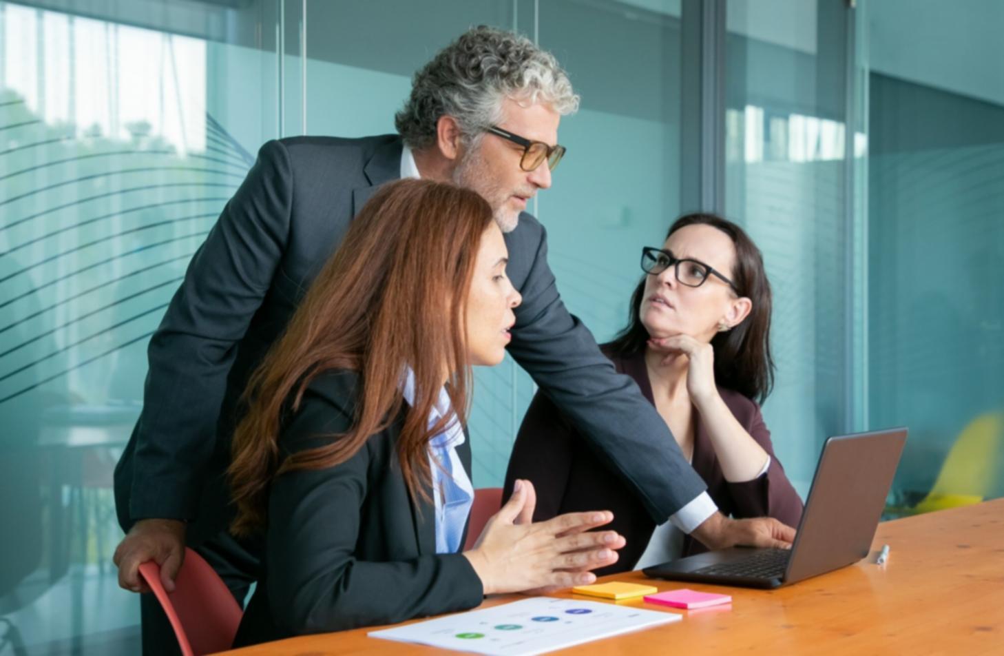 Participant reviewing budget materials during workshop